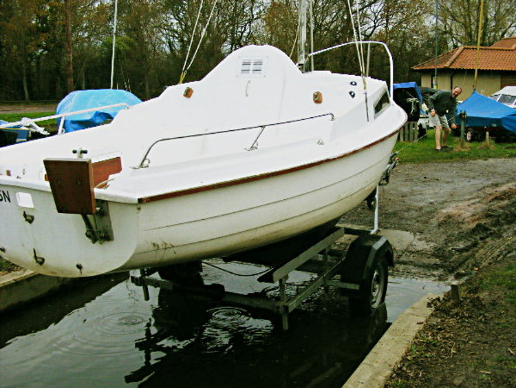 Boat and Trailer emerge from the water
